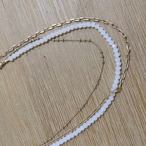 Gold triple chain necklace white beads
